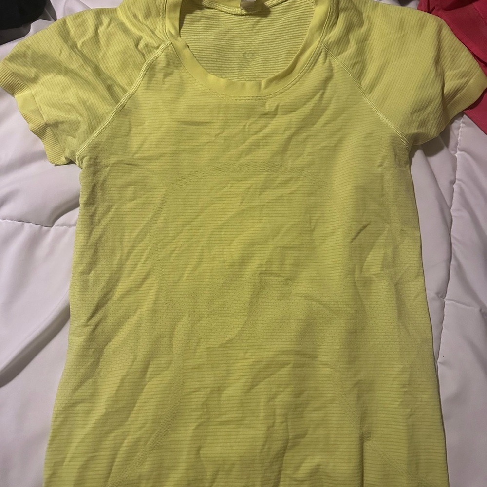 LULULEMON swiftly tech in neon yellow size 6 full length